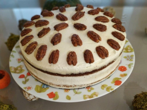 Pumpkin spice cake with maple cream cheese and crunchy candied pecans