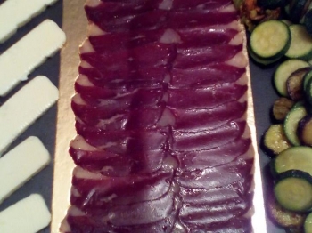 Speck d'anatra con crostini e contorno