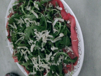 Carpaccio con rucola e grana