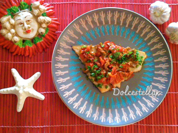 Pesce spada con pomodorini datterini, olive verdi e peperoncino rosso Etna