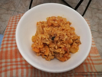 Riso con le seppie, gamberi e patate