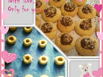 Biscotti con cuore di nutella e granella di nocciole