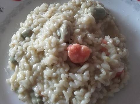 Risotto con crema di fave e gamberetti marinati