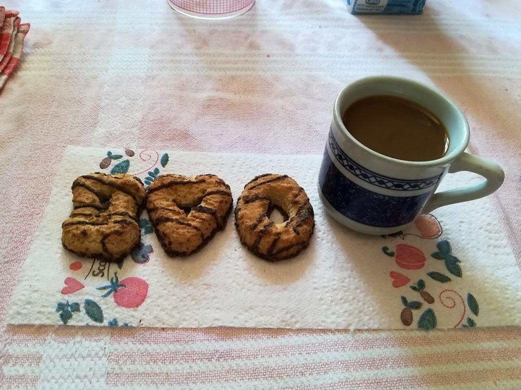 Biscotti con la frolla montata all'arancia e cioccolato fuso