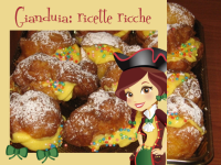 bignè fritti di carnevale con crema chantilly